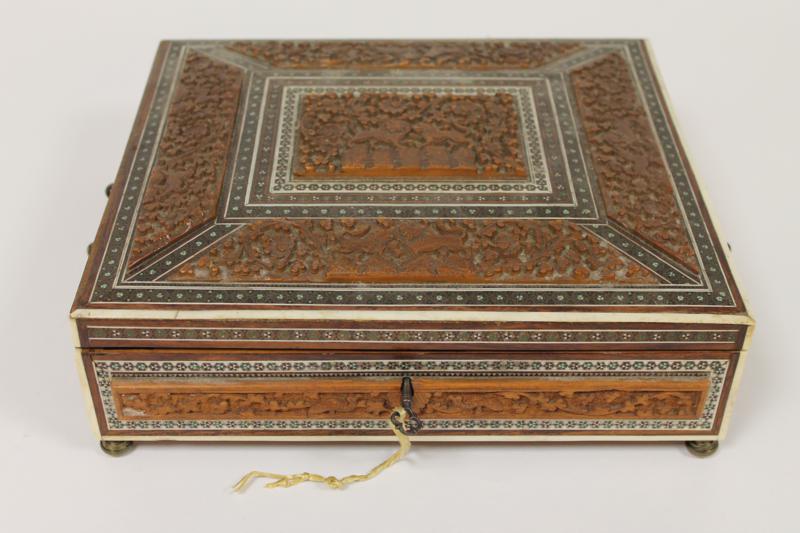A late 19th century Indian carved wood and ivory inlaid casket